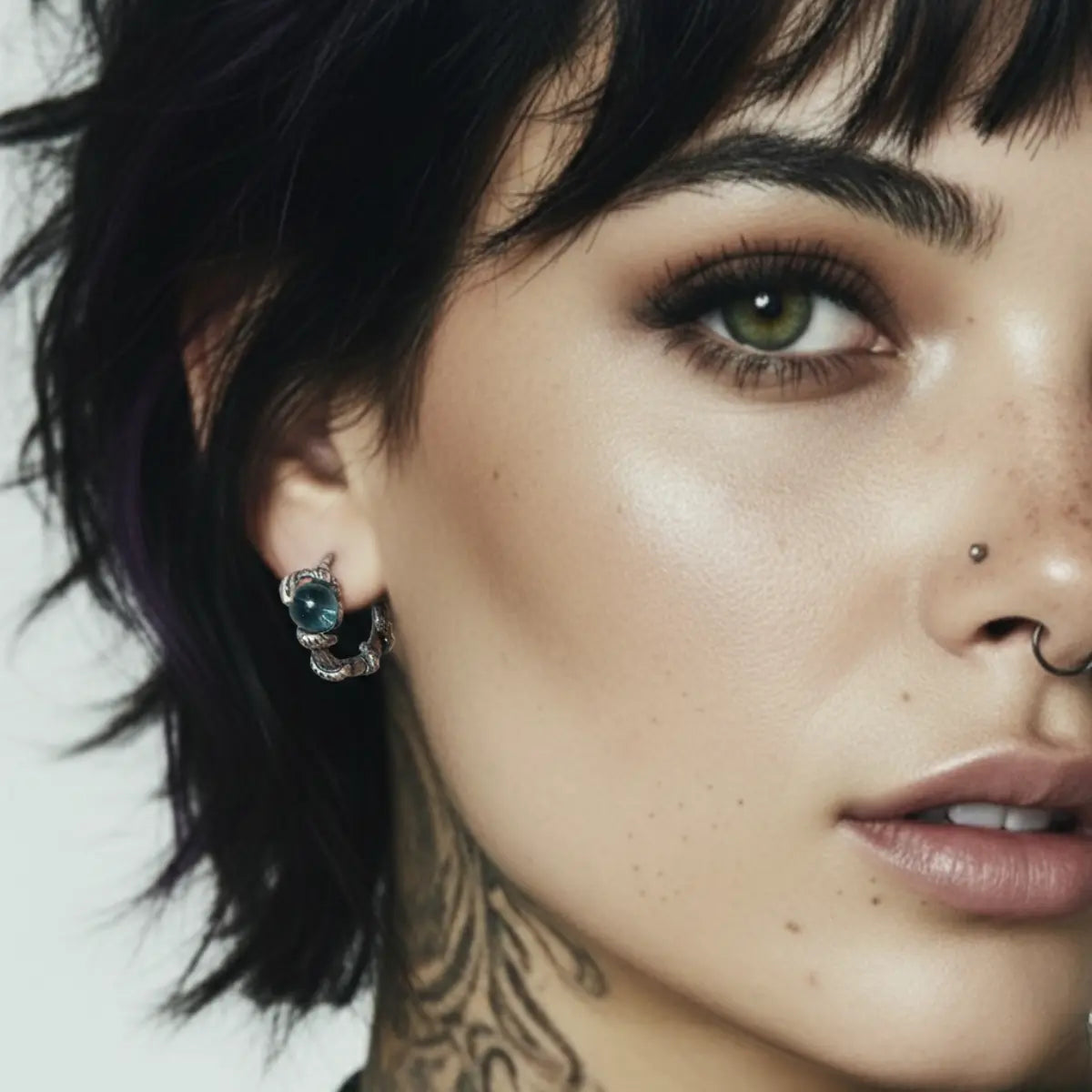 Snake Blue Topaz Hoop Earrings Worn by Female Model