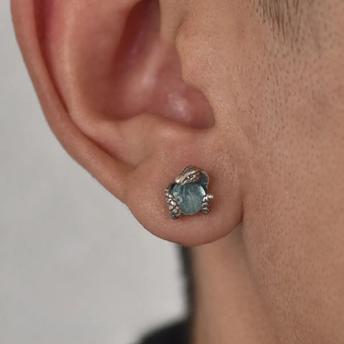 Snake Blue Topaz Stud Earrings Worn by Male Model
