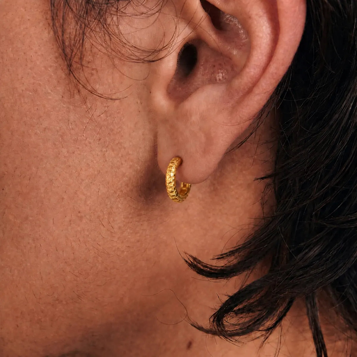 Snake Skin Hoop Earrings Gold Worn by Male Model Close Up