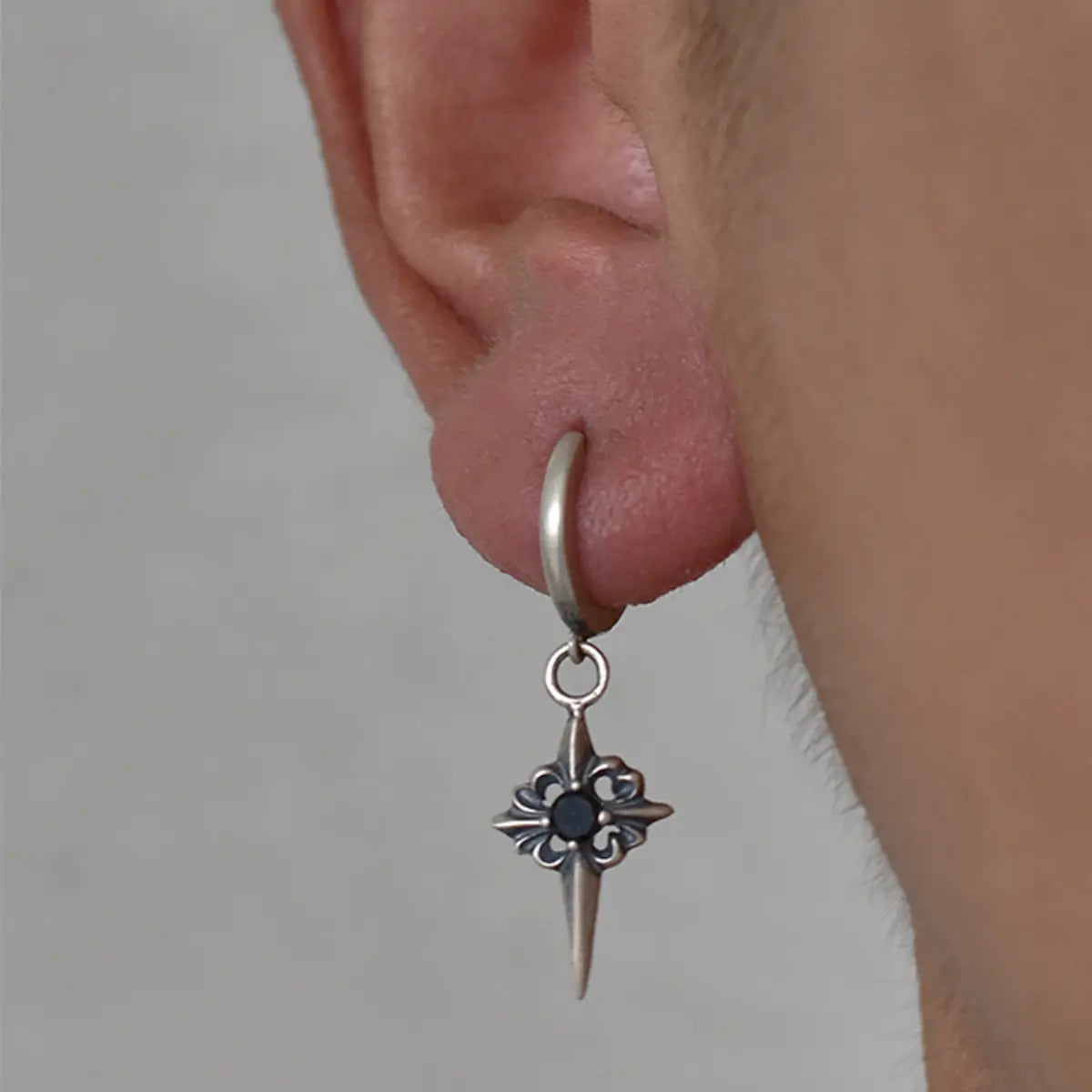 Spike Cross Drop Hoop Earrings Worn by Male Model Close Up