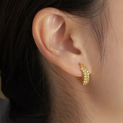 Spike Heart Earrings Gold Worn by Female Model