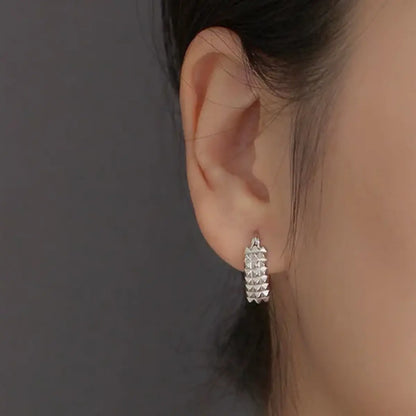 Spike Heart Earrings White Gold Worn by Female Model