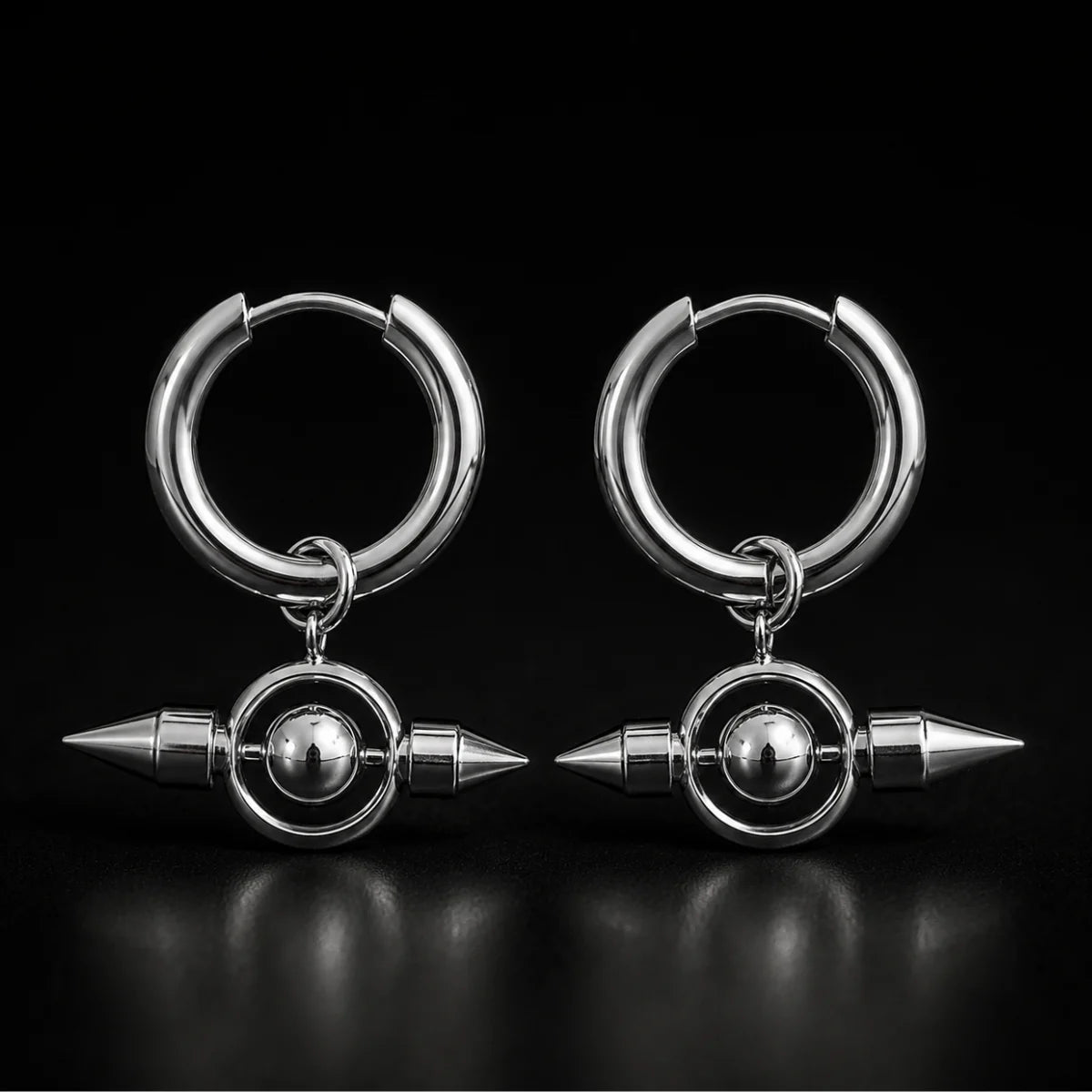 Spike Orb Drop Earrings Silver Pair Close Up Black Background