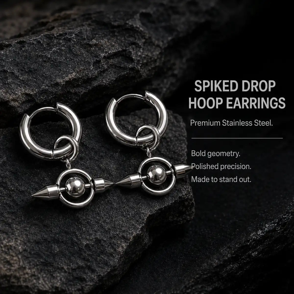 Spike Orb Drop Earrings Silver Pair Displayed on Leather Surface