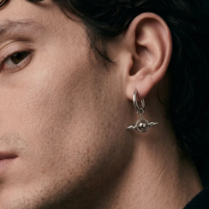 Spike Orb Drop Earrings Silver Worn by Male Model Close Up