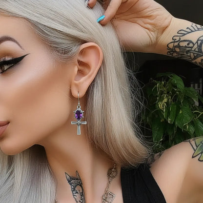 Spiked Purple Gem Ankh Dangle Earrings Worn by Female Model Side