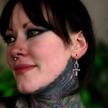 Spiked Purple Gem Ankh Dangle Earrings Worn by Female Model