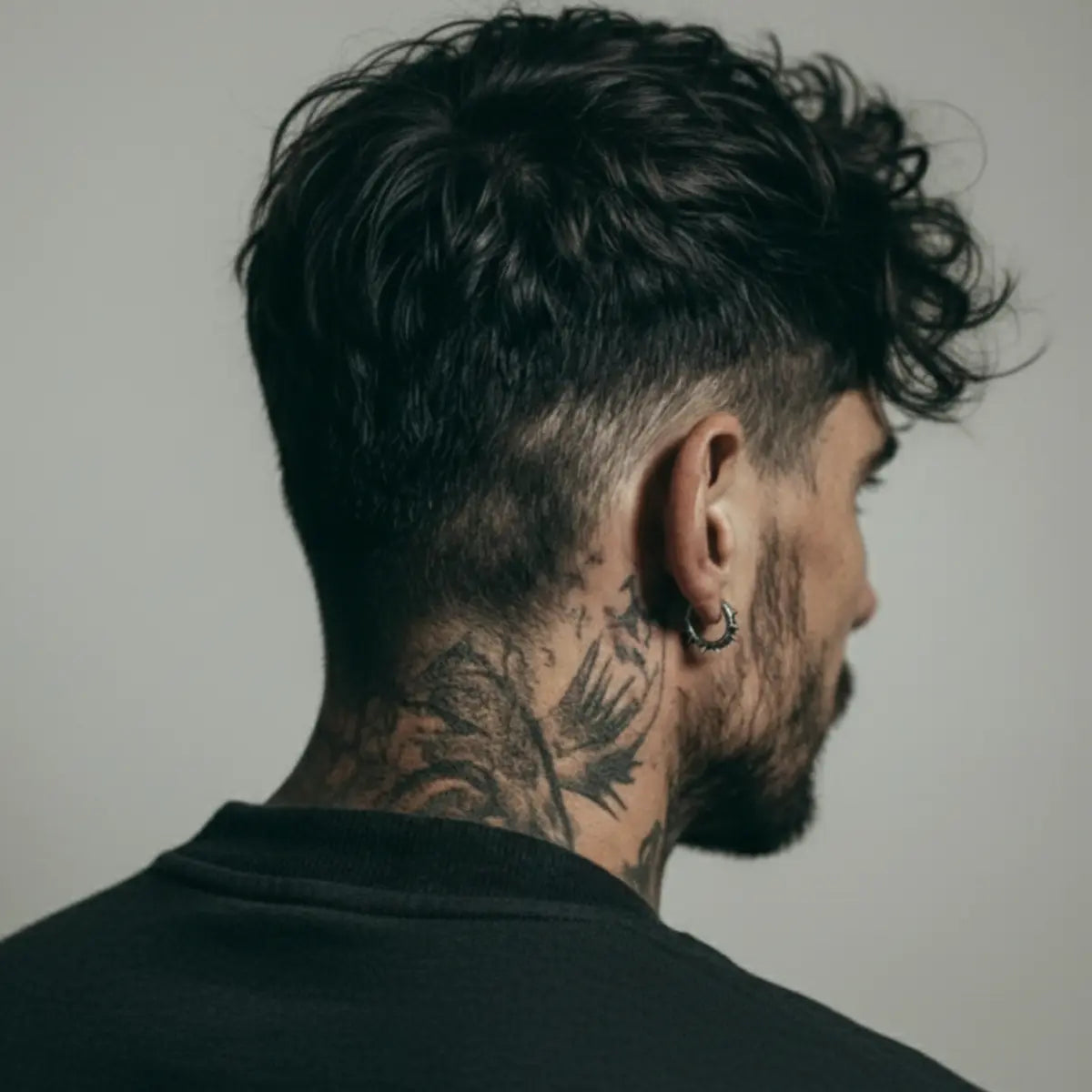 Spiked Thorn Huggie Hoop Earrings Worn by Male Model Back