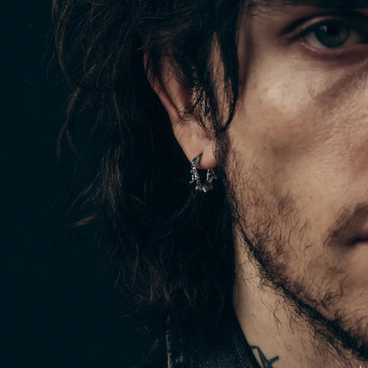 Spiked Thorn Huggie Hoop Earrings Worn by Male Model Front
