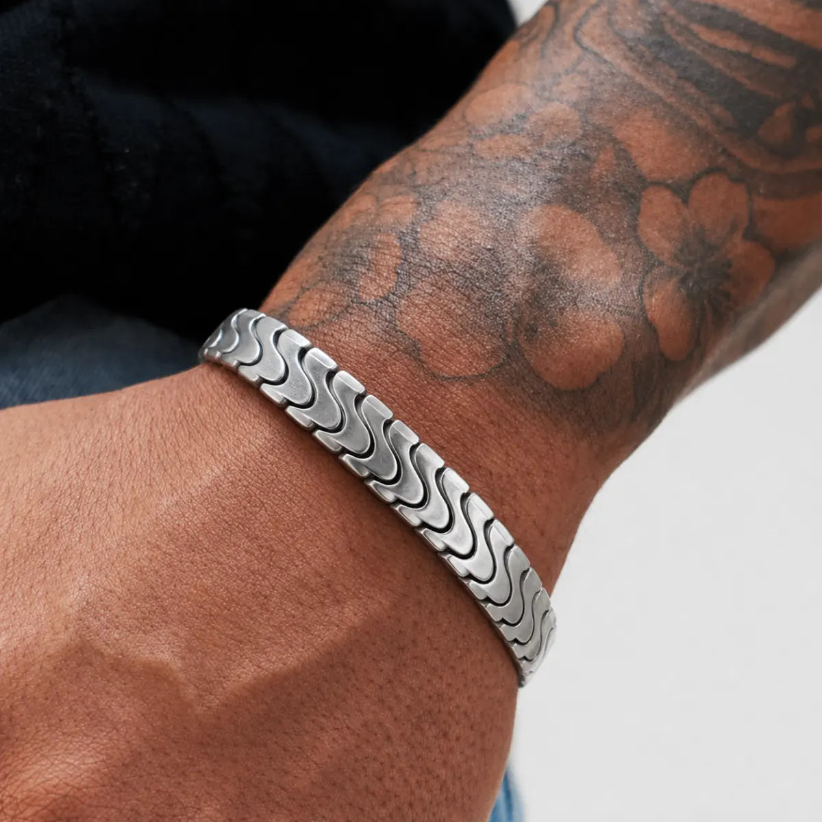Spine Link Bracelet Silver 12mm Worn on Hand Close Up
