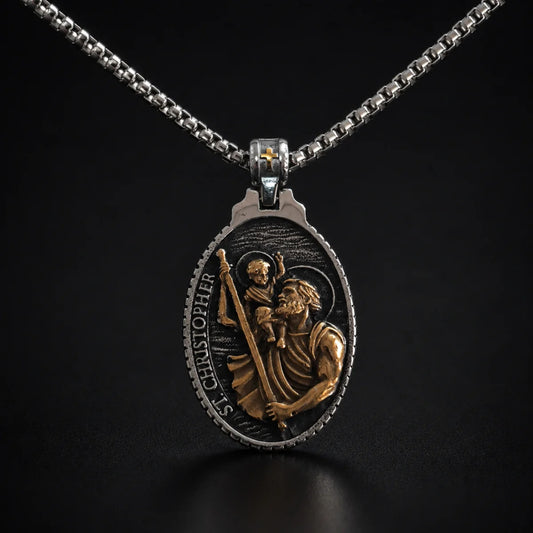 St Christopher Oval Pendant Necklace Gold and Silver Close Up Black Background