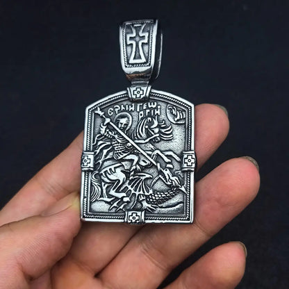 St George Medal Held in Hand Front