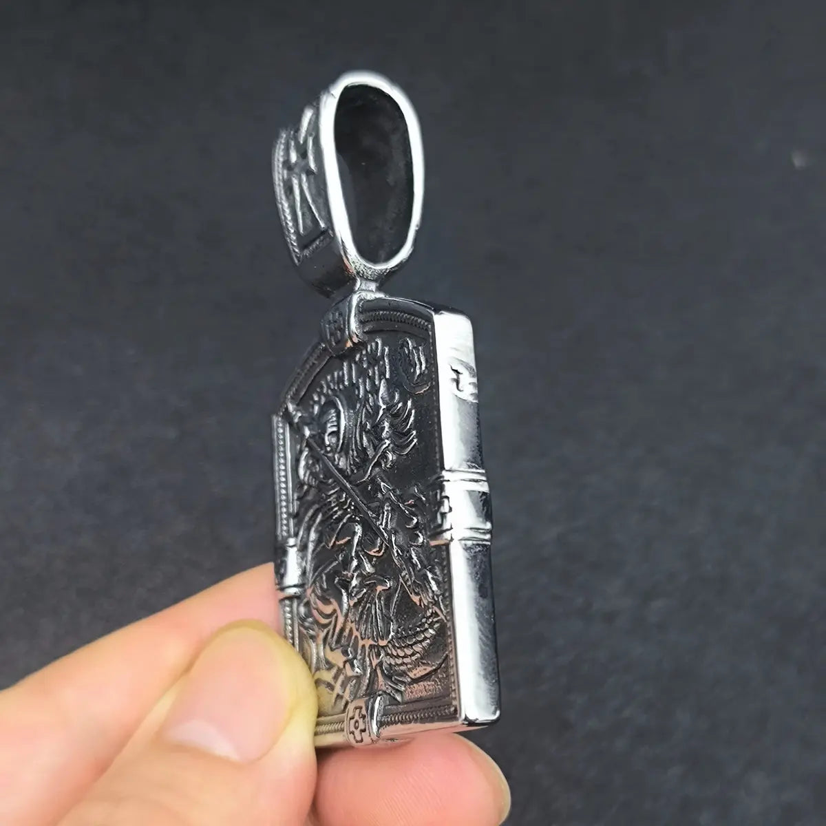 St George Medal Held in Hand Side