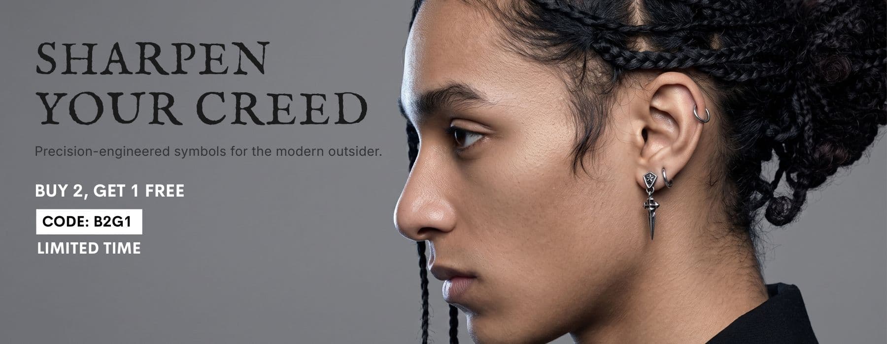 Stainless Steel Sword Earring | Alternative Dark Jewelry. Model wearing a sharp dagger earring