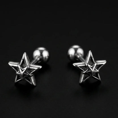 Star Cartilage Stud Earrings Silver Close Up Black Background