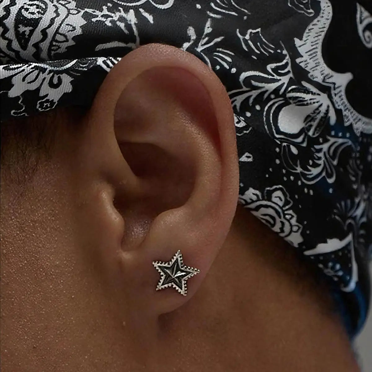 Star Stud Earrings Sterling Silver Worn by Male Model Close Up