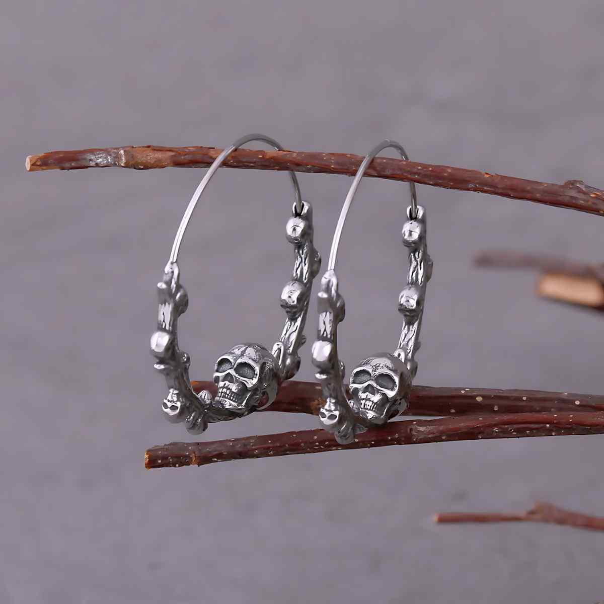 Steel Skulls on Branch Hoop Earrings