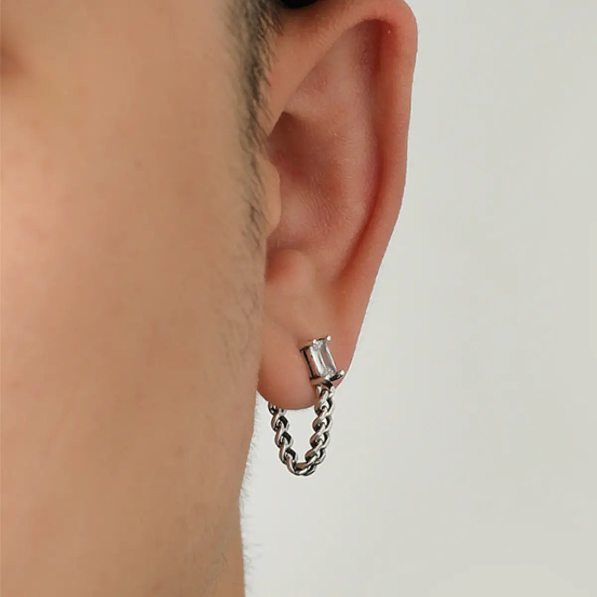 Sterling Silver Chain Dangle CZ Earrings Worn by Male Model Close Up