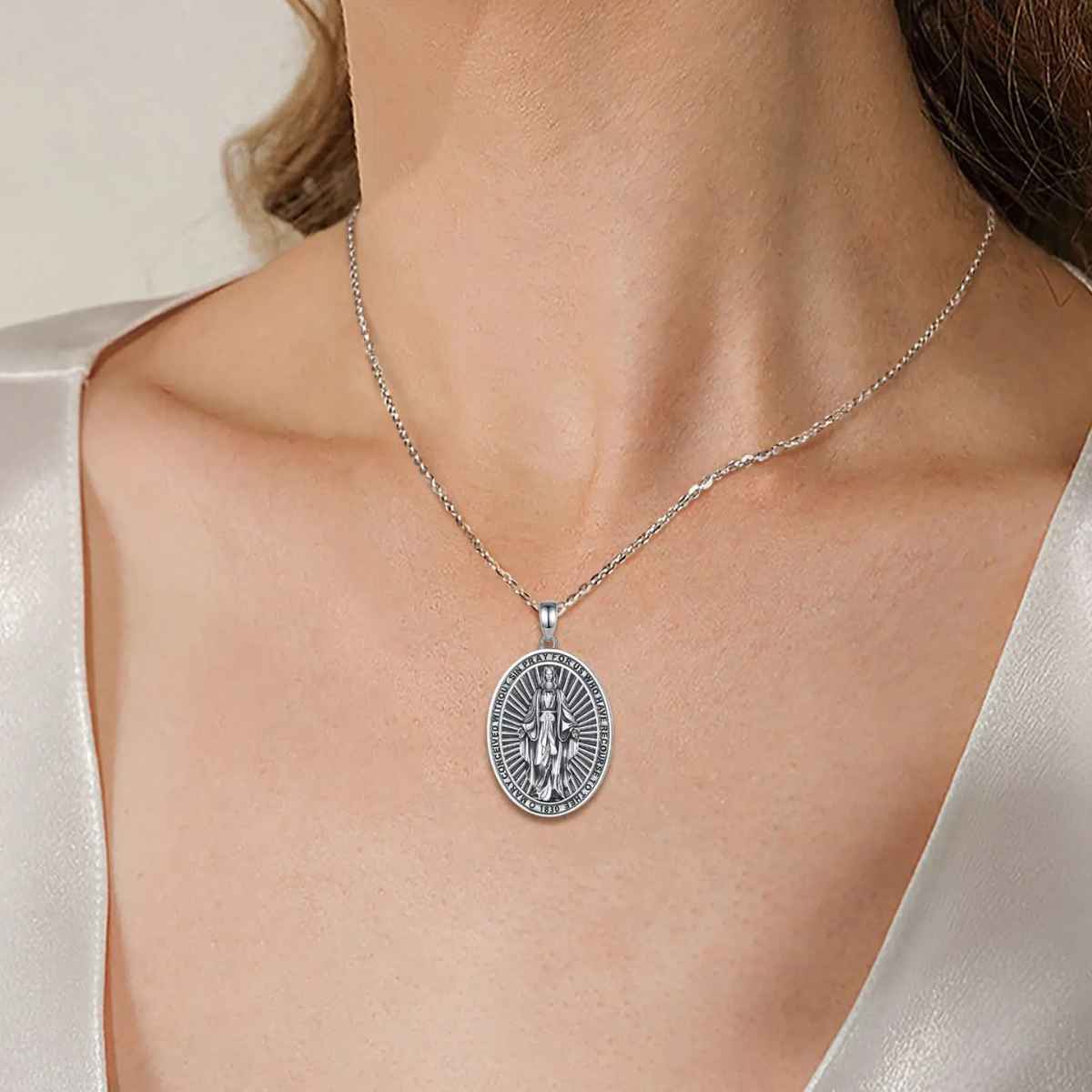 Sterling Silver Miraculous Medal Necklace Worn by Model Xenos Jewelry