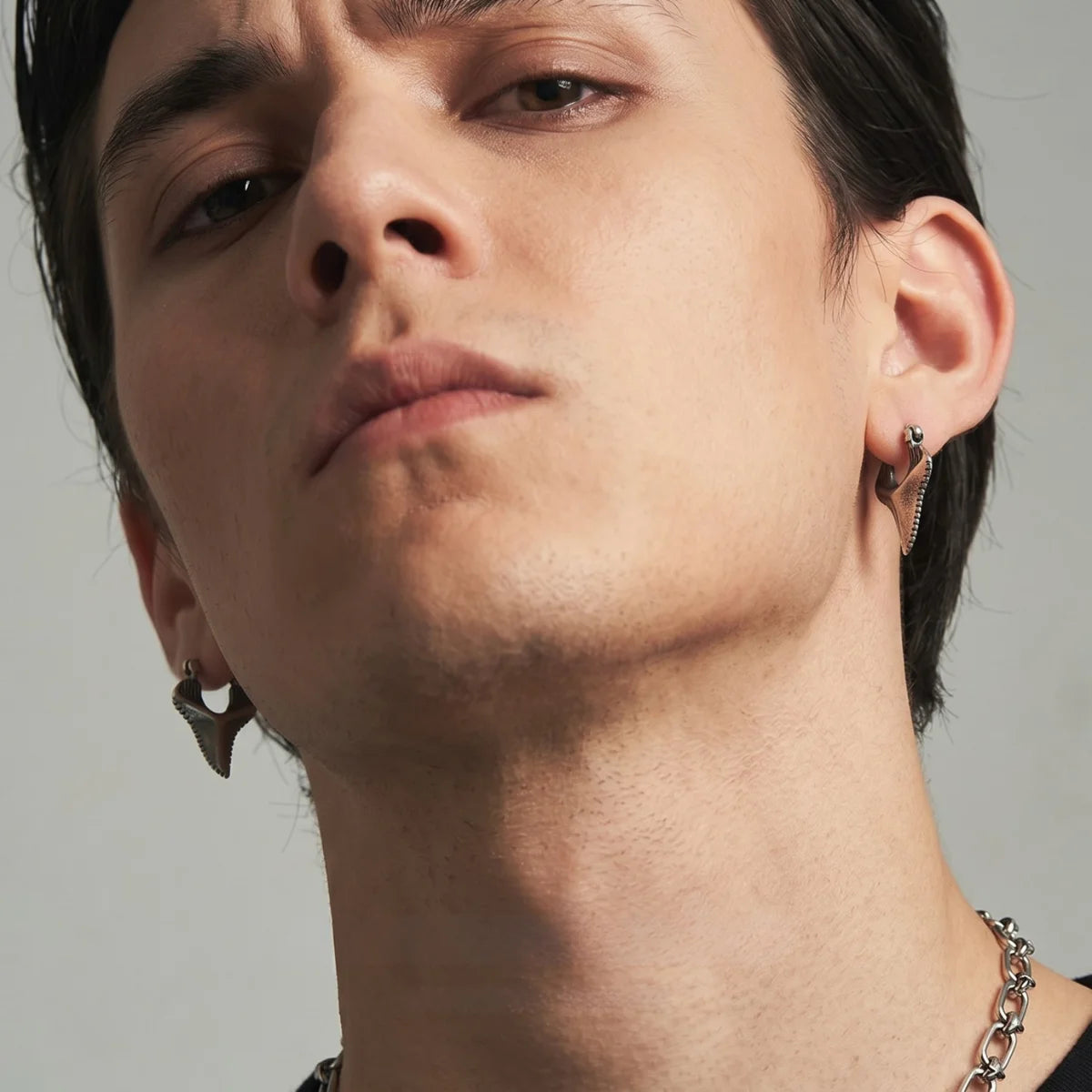 Sterling Silver Shark Tooth Earrings Worn by Male Model Front