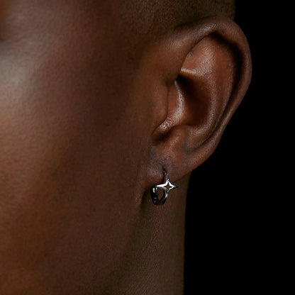 Sterling Silver Star Hoop Earrings Silver Worn by Male Model Front View