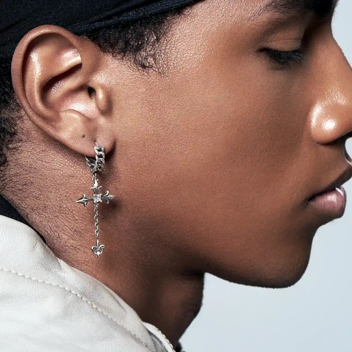 Sterling Silver Twisted Hoop Cross Dangle Earrings Worn by Male Model