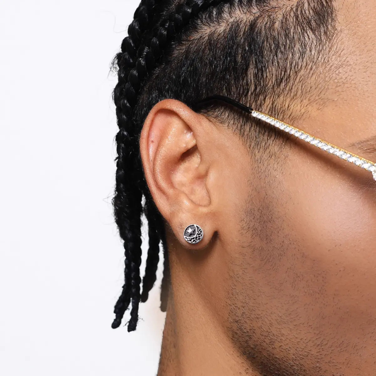 Sun and moon studs earrings worn by male model