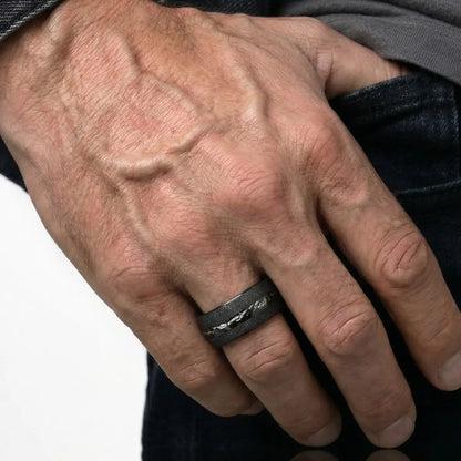 Male model wearing Black Meteorite Tungsten Ring