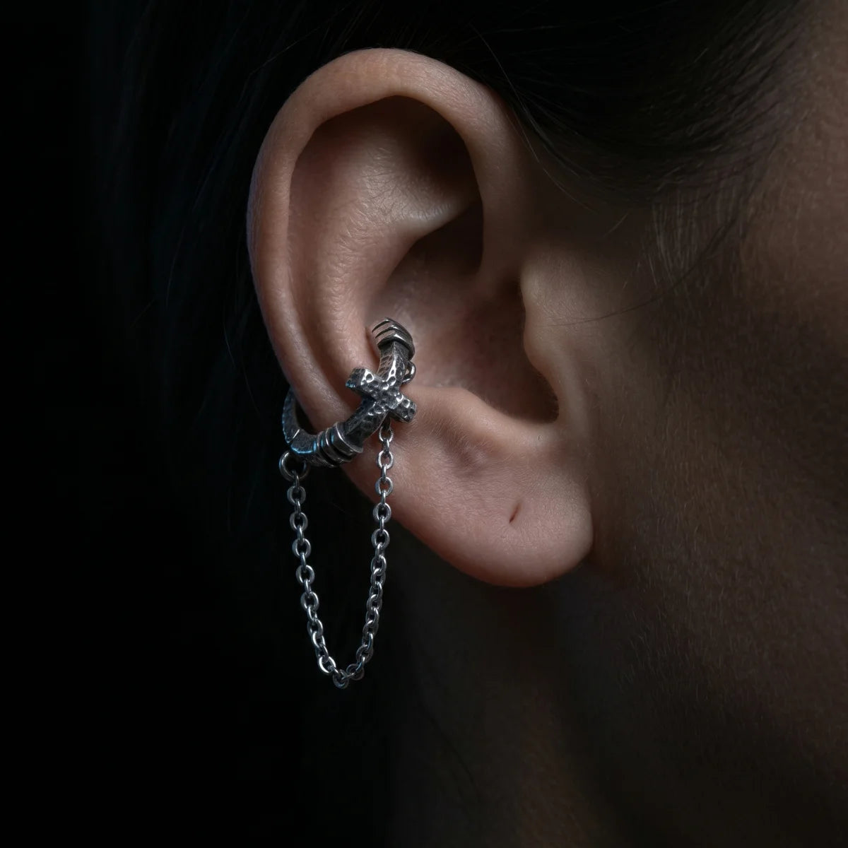 Textured Cross Chain Hoop Earrings Worn by Female Model Close Up