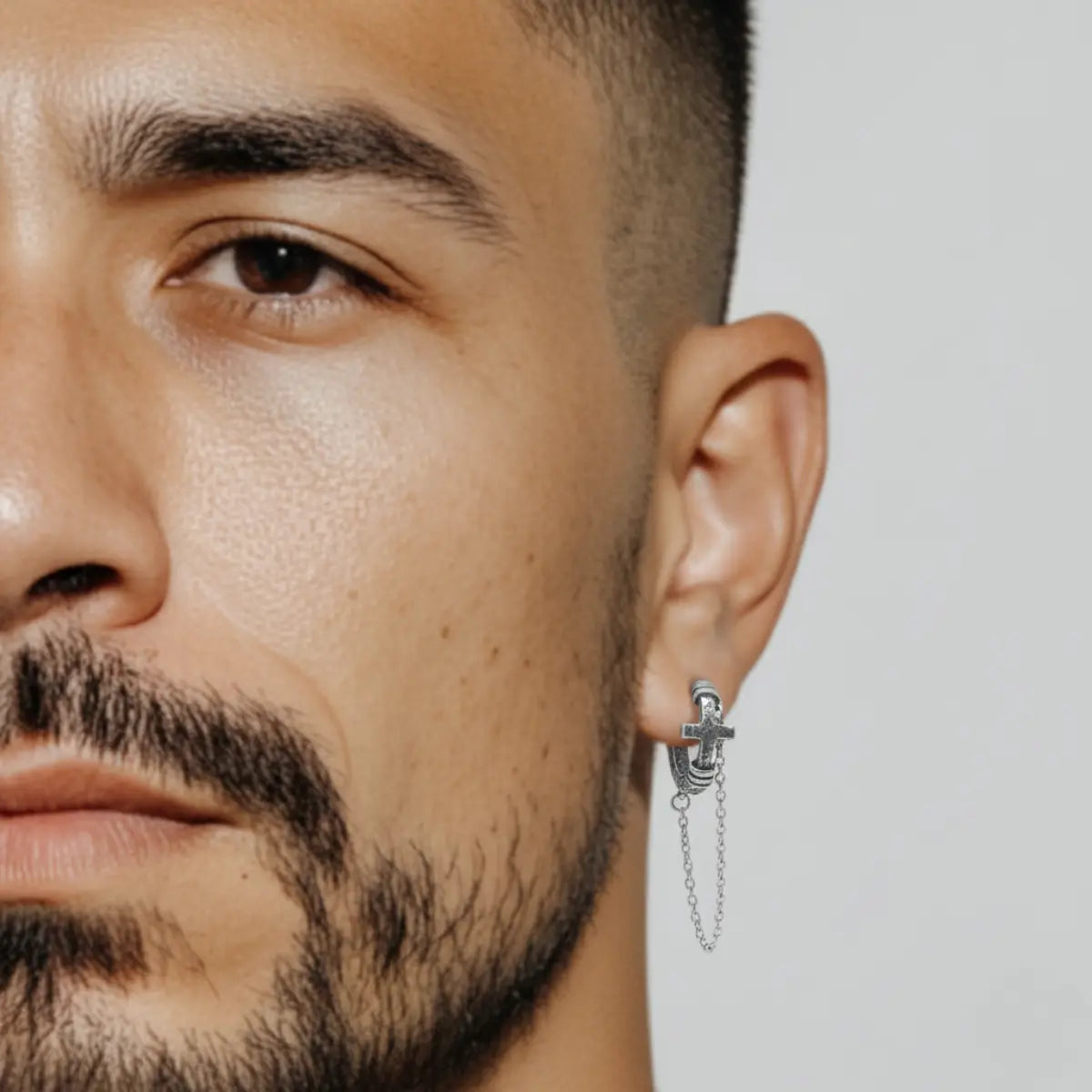 Textured Cross Chain Hoop Earrings Worn by Male Model