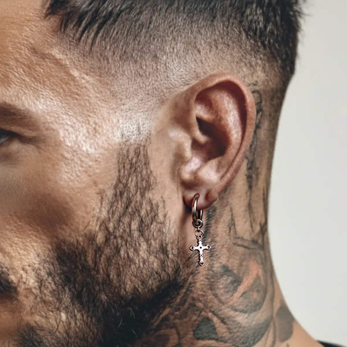 Textured Cross Dangle Hoop Earrings Silver Worn by Male Model Back