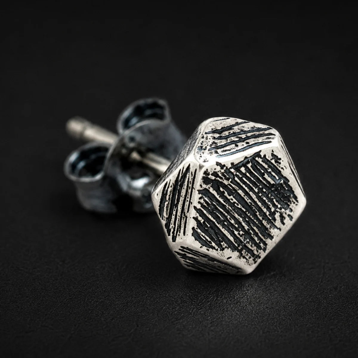 Textured Geometric Stud Earrings 925 Silver Single Earring Close Up Black Background