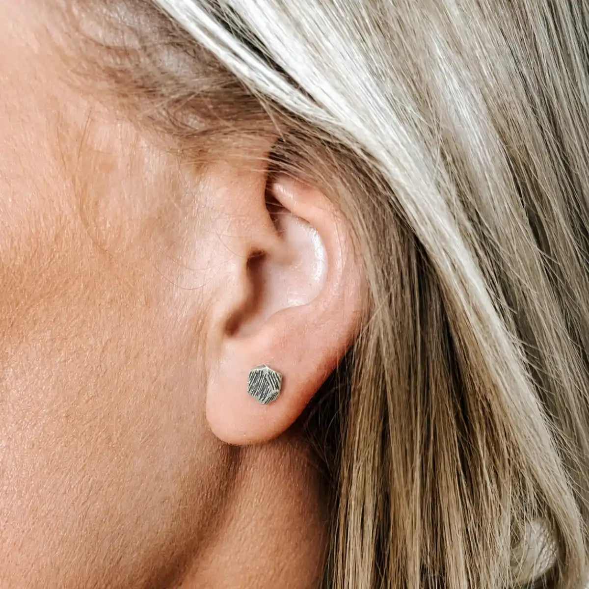 Textured Geometric Stud Earrings 925 Silver Worn by Female Model Close Up