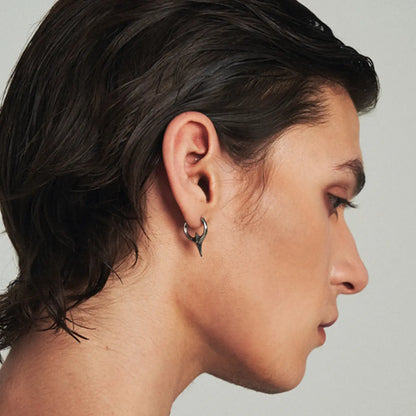 Textured Spike Huggie Hoop Earrings Worn by Male Model Side View