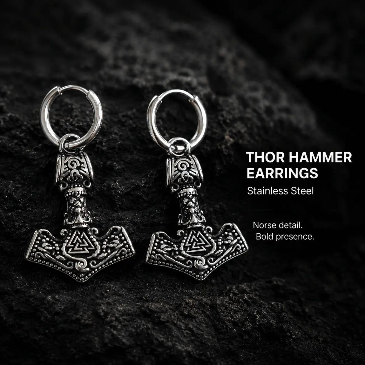 Thor Hammer Earrings Silver Pair Displayed on Stone Surface