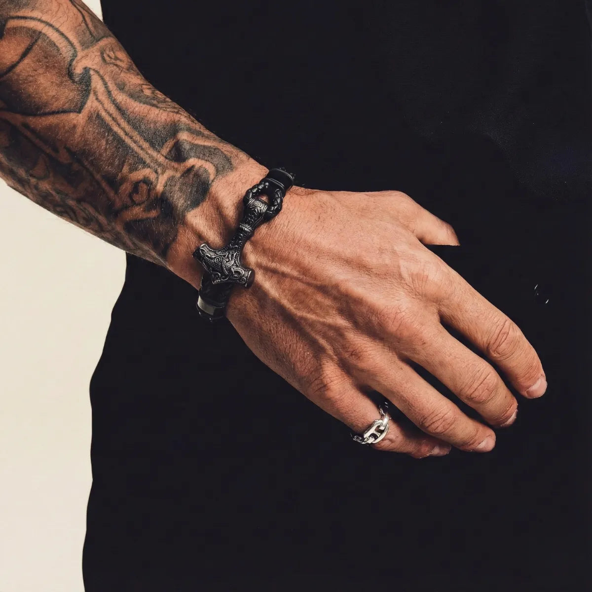 Thors Hammer Mjolnir Leather Bracelet Black Worn by Male Model