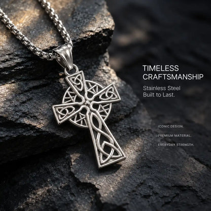 Trinity Knot Cross Necklace Silver Displayed on Stone Surface