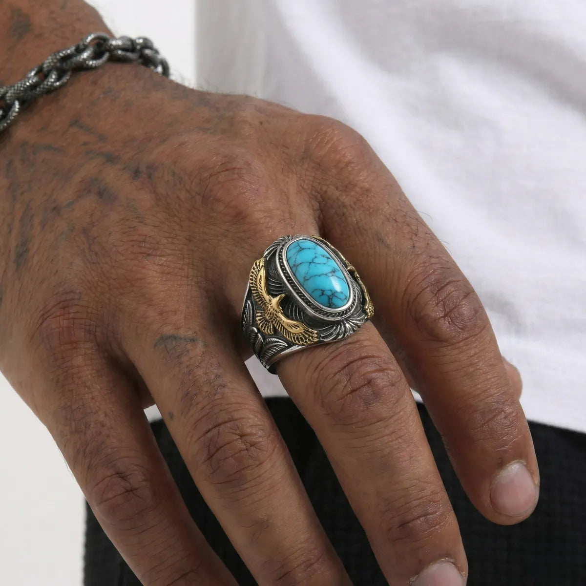 Turquoise Eagle Ring Gold Worn by Male Model Close Up