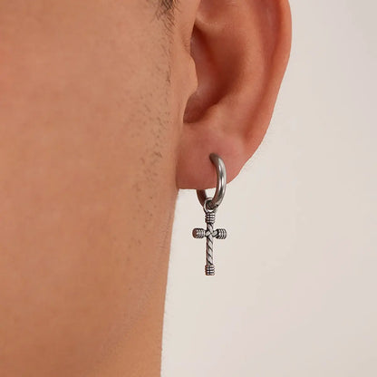 Twisted Cross Dangle Hoop Earrings Worn by Male Model Close Up