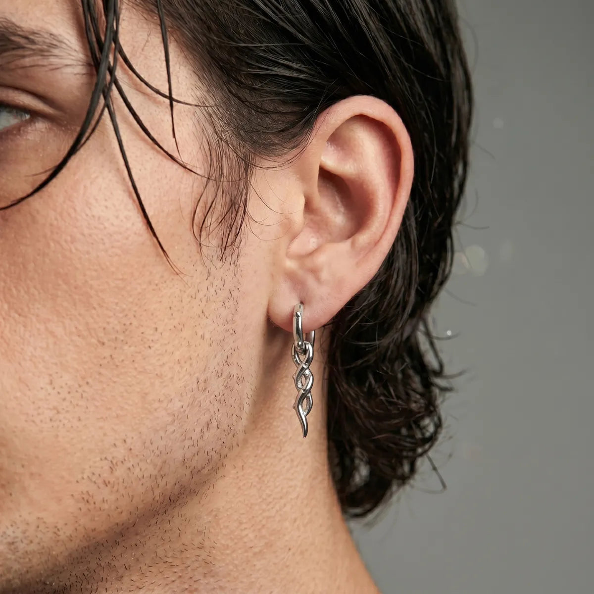 Twisted Spike Drop Earrings Worn by Male Model