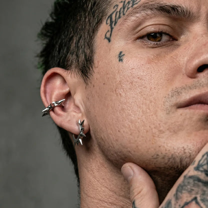 Two Large Spike Hoop Earrings Silver Worn by Male Model