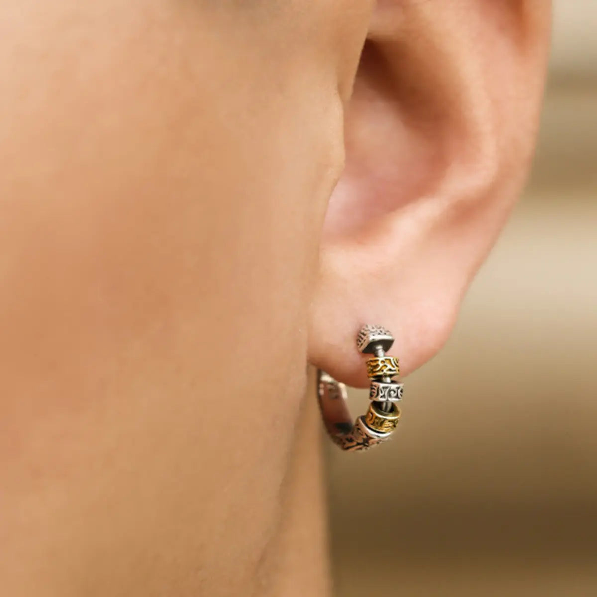Two Tone Bead Hoop Earrings Worn by Male Model Close Up