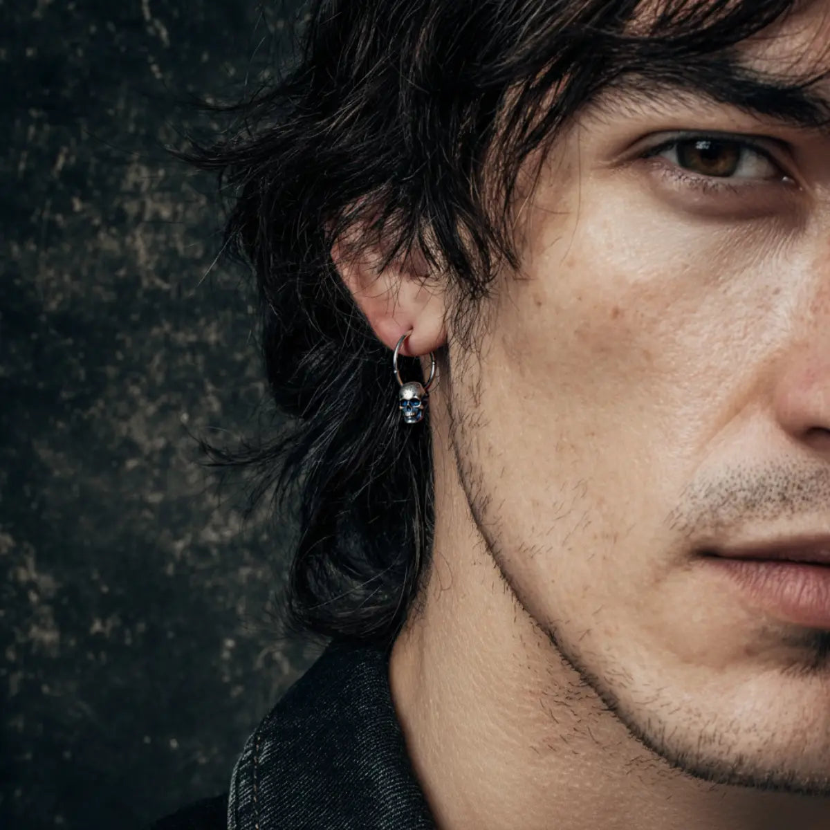 Unisex Skull Huggie Hoop Earrings Sterling Silver Worn by Male Model