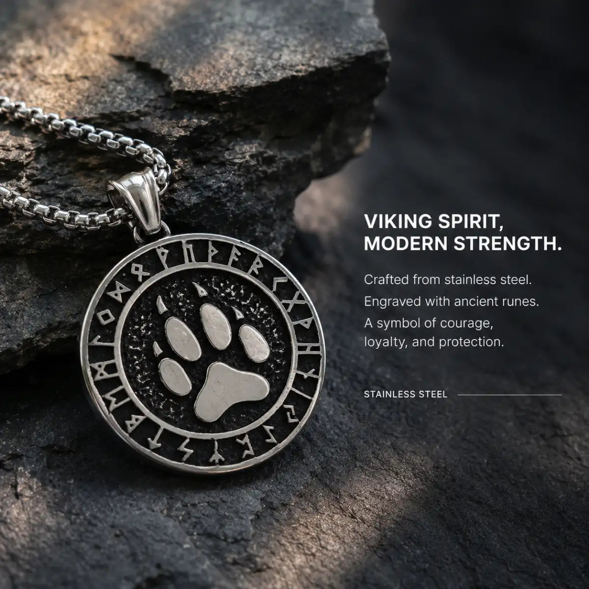 Viking Bear Paw Rune Pendant Necklace Silver Displayed on Stone Surface