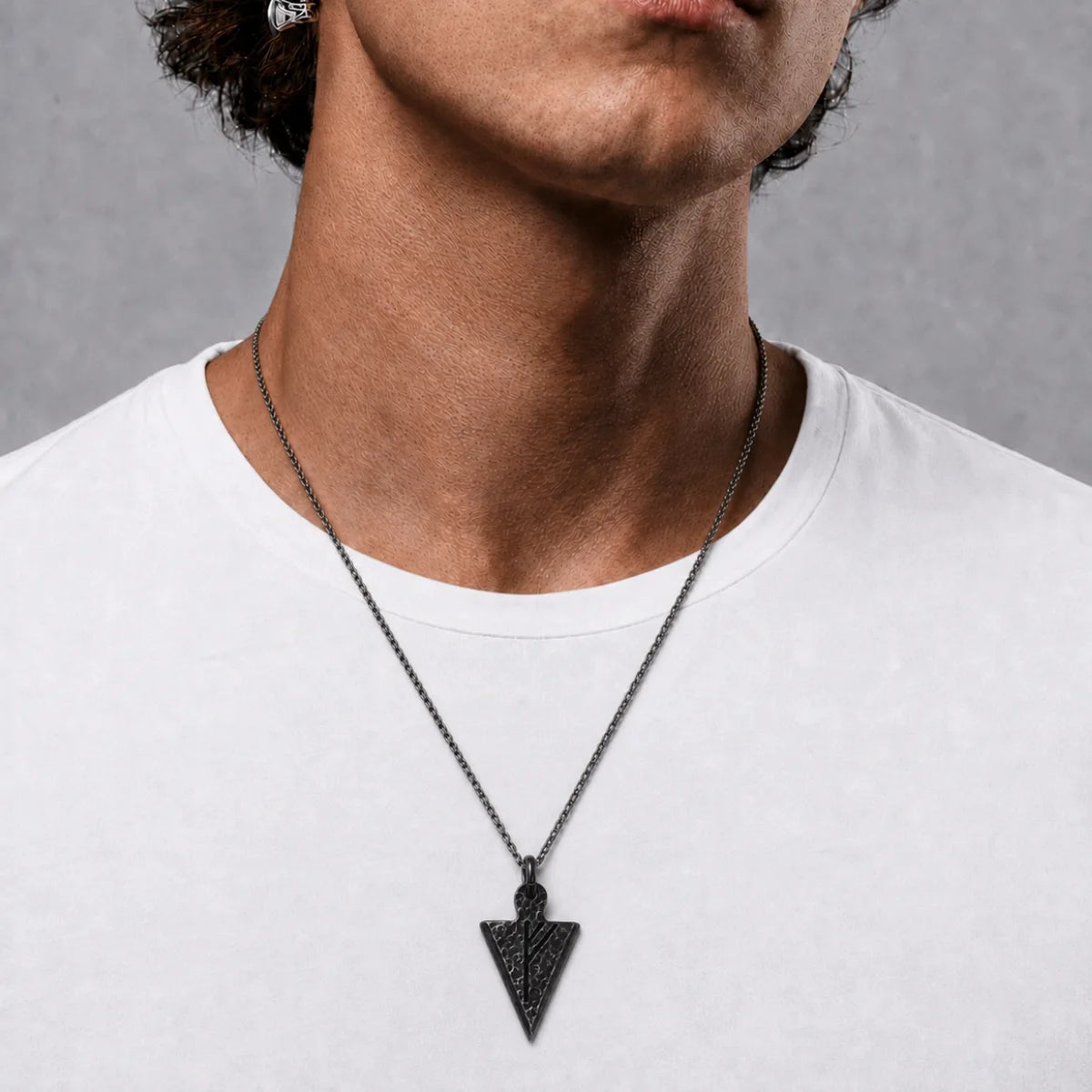 Viking Rune Arrowhead Necklace Silver Worn by Male Model Chest View