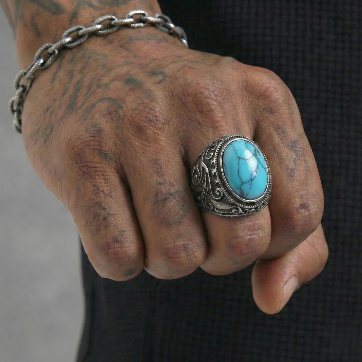 Vintage Black Engraved Turquoise Ring Worn by Male Model Close Up