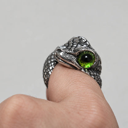 Viper Ring Silver Green Eye Worn on Thumb Close Up