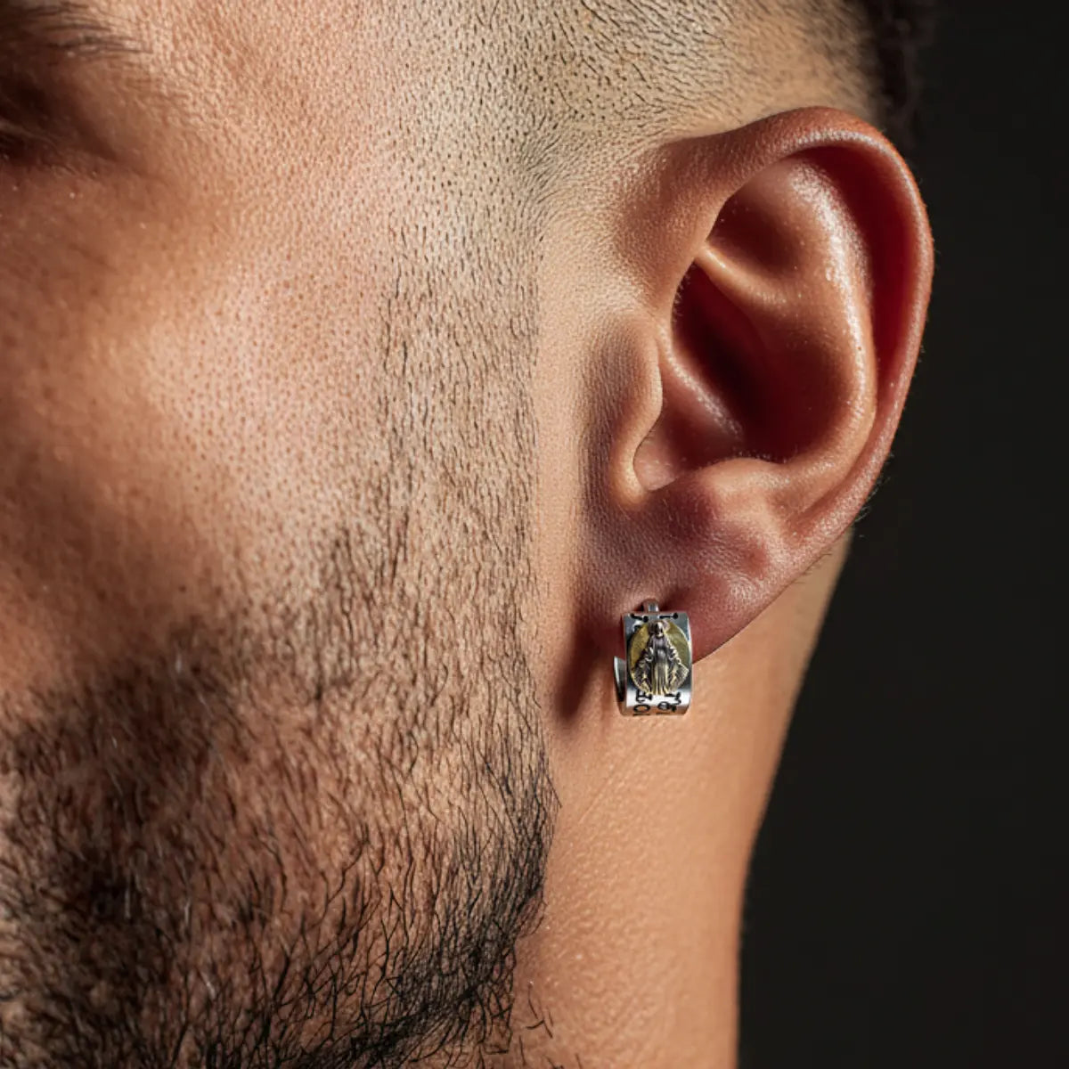 Virgin Mary Earrings Sterling Silver Worn by Male Model Close Up