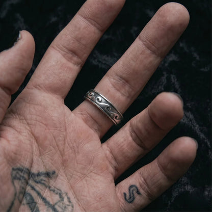 Wave Band Ring Silver Worn on Palm Up Hand Close Up