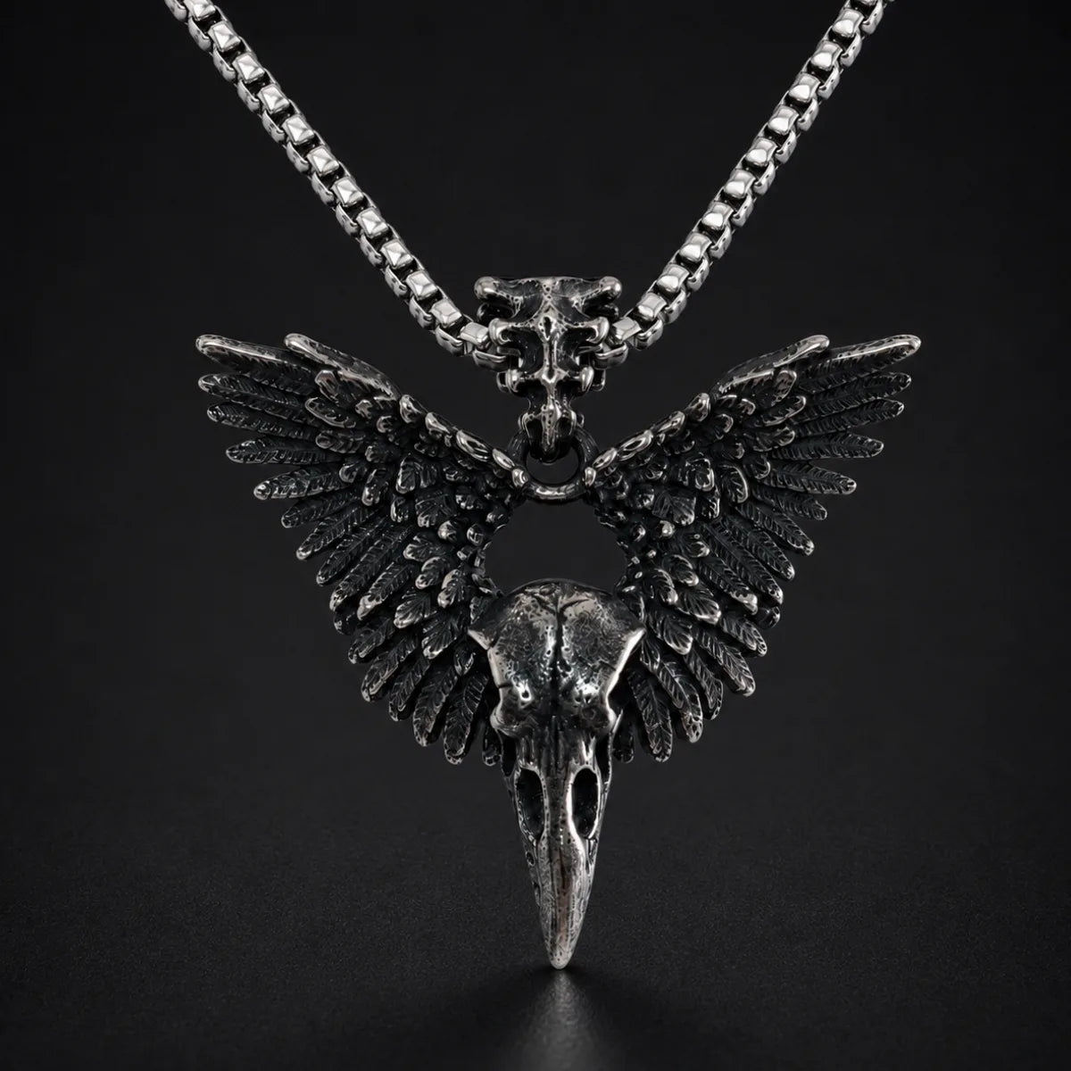 Winged Raven Skull Necklace Antique Silver Close Up Black Background